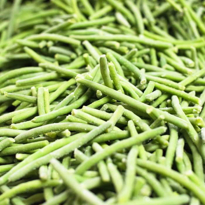 Gros plan de haricots verts congelés